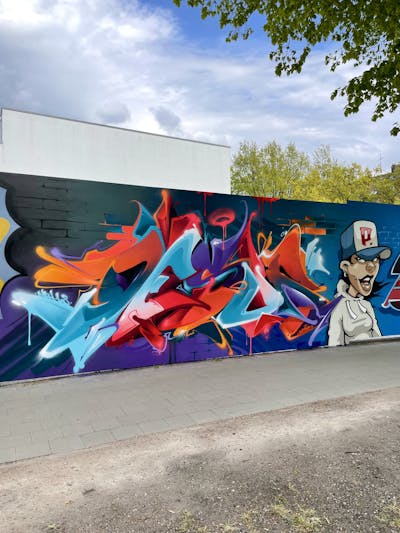 Colorful Stylewriting by Desur and Ptoons. This Graffiti is located in Hamburg, Germany and was created in 2022. This Graffiti can be described as Stylewriting, Wall of Fame and Characters.