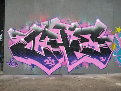 Coralle and Black Stylewriting by SW, 203 and CHE. This Graffiti is located in Heerlen, Netherlands and was created in 2023.