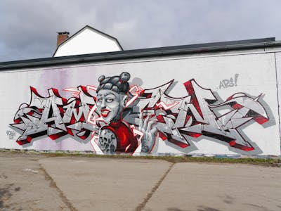 Red and Grey Stylewriting by Tokk and Amen. This Graffiti is located in Bremen, Germany and was created in 2022. This Graffiti can be described as Stylewriting and Characters.