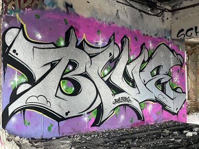 Chrome Stylewriting by BROKE420 and BLUE. This Graffiti is located in Magdeburg, Germany and was created in 2024. This Graffiti can be described as Stylewriting and Abandoned.