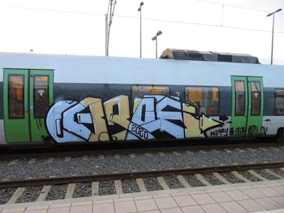 Light Blue and Beige Stylewriting by rizok, R120K and bros. This Graffiti is located in Leipzig, Germany and was created in 2020. This Graffiti can be described as Stylewriting and Trains.