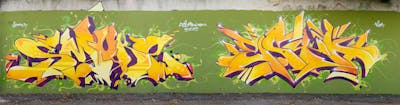 Violet and Light Green and Yellow Stylewriting by Smoke 13, Esta and TGSCREW. This Graffiti is located in Tivoli, Italy and was created in 2023.