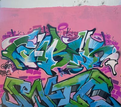 Light Green and Light Blue Stylewriting by Yellow Fat Crew and Gaber. This Graffiti is located in Brescia, Italy and was created in 2021. This Graffiti can be described as Stylewriting and Wall of Fame.