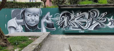 Cyan and Grey Characters by Nexgraff. This Graffiti is located in donostia, Spain and was created in 2021. This Graffiti can be described as Characters, Murals, 3D and Stylewriting.