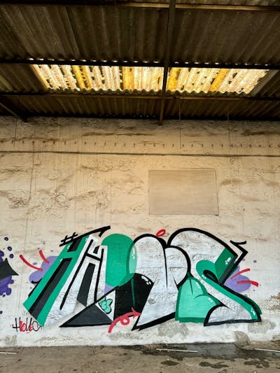 Chrome and Light Green Stylewriting by Dr. Hione. This Graffiti is located in Portugal and was created in 2024. This Graffiti can be described as Stylewriting and Abandoned.