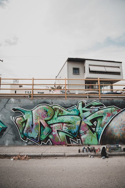 Colorful and Grey Stylewriting by Merlin. This Graffiti is located in Katerini, Greece and was created in 2022. This Graffiti can be described as Stylewriting and Wall of Fame.
