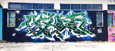 Green and White Stylewriting by Spant. This Graffiti is located in Levadia, Greece and was created in 2024.