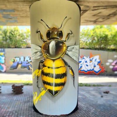 Yellow and Black Characters by Atelier wandART. This Graffiti is located in Basel, Switzerland and was created in 2022. This Graffiti can be described as Characters and Wall of Fame.