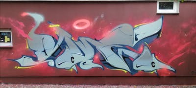 Grey and Red Stylewriting by mtl crew and Roweo. This Graffiti is located in Saalfeld (Saale), Germany and was created in 2022.