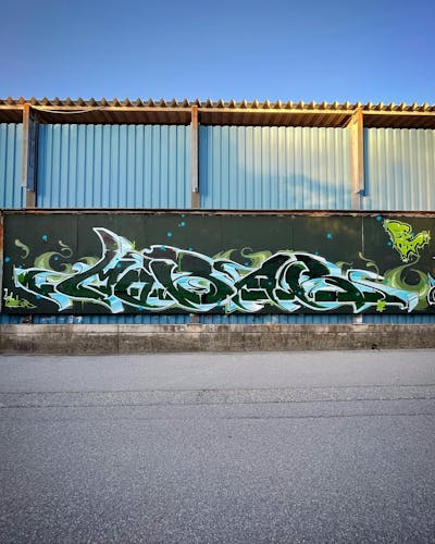 Green and Light Blue Stylewriting by mobar. This Graffiti is located in Zirl, Austria and was created in 2022.