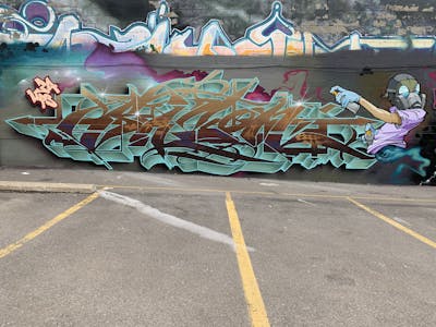 Cyan and Brown and Colorful Stylewriting by Bacon. This Graffiti is located in Toronto, Canada and was created in 2020. This Graffiti can be described as Stylewriting and Characters.