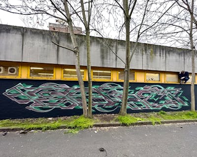 Coralle and Light Green and Green Wall of Fame by SARE. This Graffiti is located in Mainz, Germany and was created in 2023. This Graffiti can be described as Wall of Fame, Stylewriting and Futuristic.