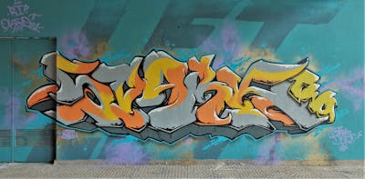 Grey and Orange and Cyan Stylewriting by SparkTwo and LFT. This Graffiti is located in IOANNINA, Greece and was created in 2021. This Graffiti can be described as Stylewriting and Wall of Fame.