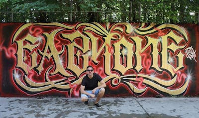 Gold and Red Stylewriting by Eazy One. This Graffiti is located in Geneva, Switzerland and was created in 2023.