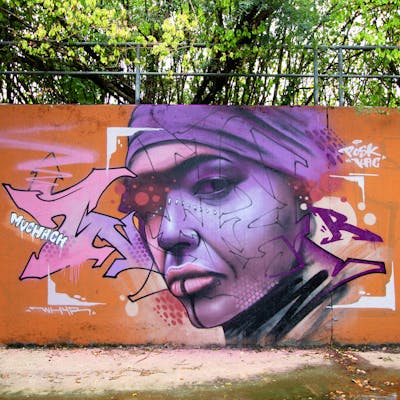 Violet and Coralle and Orange Stylewriting by Whyre87, Posk crew and KAC crew. This Graffiti is located in Geneva, Switzerland and was created in 2022. This Graffiti can be described as Stylewriting, Characters and Wall of Fame.