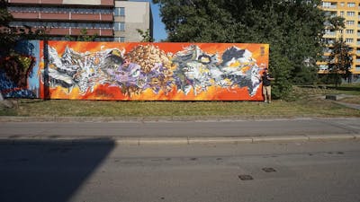 Colorful and Orange Stylewriting by MozgeR. This Graffiti is located in Ostrava, Czech Republic and was created in 2015. This Graffiti can be described as Stylewriting, 3D, Characters and Streetart.