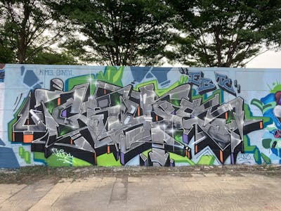 Grey and Black and Colorful Stylewriting by Crude. This Graffiti is located in Bangkok, Thailand and was created in 2023. This Graffiti can be described as Stylewriting and Wall of Fame.