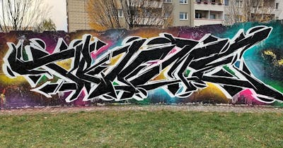 Colorful and Black and White Stylewriting by Prime. This Graffiti is located in Halle/Saale, Germany and was created in 2022. This Graffiti can be described as Stylewriting and Wall of Fame.