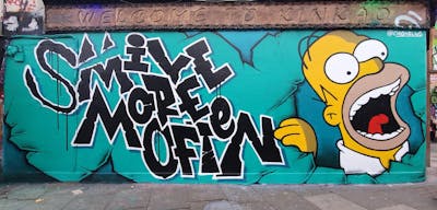 Cyan and Black and Yellow Stylewriting by Nelius and smo__crew. This Graffiti is located in London, United Kingdom and was created in 2023. This Graffiti can be described as Stylewriting and Characters.