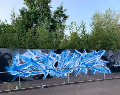 Light Blue and Grey Stylewriting by Prime. This Graffiti is located in Halle/Saale, Germany and was created in 2022.
