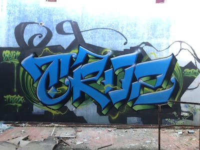 Blue and Light Green Stylewriting by TROZ ONE. This Graffiti is located in Split, Croatia and was created in 2021. This Graffiti can be described as Stylewriting and Wall of Fame.