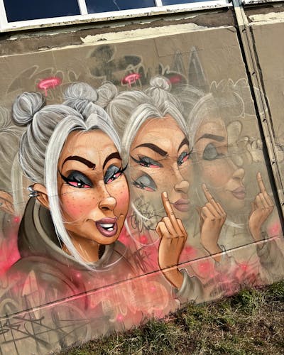 Grey and Beige and Coralle Stylewriting by Tokk. This Graffiti is located in Salzwedel, Germany and was created in 2024. This Graffiti can be described as Stylewriting and Characters.