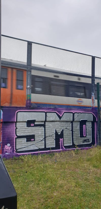 Chrome and Violet Stylewriting by smo__crew and Sky High. This Graffiti is located in London, United Kingdom and was created in 2021. This Graffiti can be described as Stylewriting and Line Bombing.