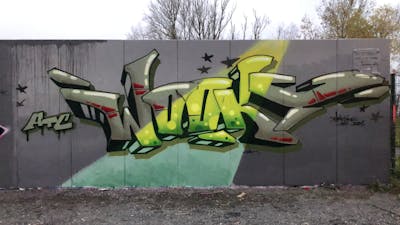 Grey and Light Green Stylewriting by WOOKY. This Graffiti is located in Leipzig, Germany and was created in 2022. This Graffiti can be described as Stylewriting and Wall of Fame.