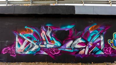Colorful Stylewriting by SNUZ. This Graffiti was created in 2021 but its location is unknown. This Graffiti can be described as Stylewriting and Futuristic.