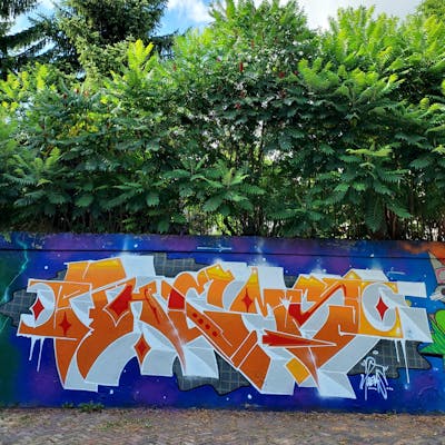 Orange and White and Blue Stylewriting by Fems173. This Graffiti is located in lublin, Poland and was created in 2023.