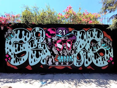 Colorful and Light Blue Stylewriting by Giusseppe. This Graffiti is located in CDMX, Mexico and was created in 2021. This Graffiti can be described as Stylewriting and Characters.