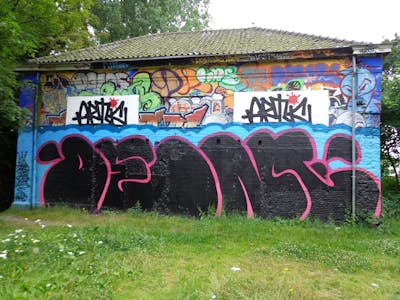 Black and Violet and Light Blue Stylewriting by DEM. This Graffiti is located in Akerslot, Netherlands and was created in 2011. This Graffiti can be described as Stylewriting and Wall of Fame.