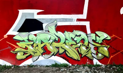 Light Green and Red Stylewriting by Fares. This Graffiti is located in Milano, Italy and was created in 2021.