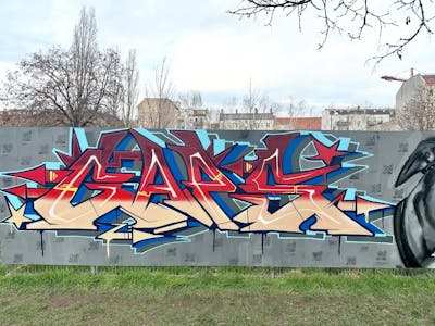 Colorful and Beige and Red Stylewriting by Gaps. This Graffiti is located in Leipzig, Germany and was created in 2024. This Graffiti can be described as Stylewriting and Wall of Fame.