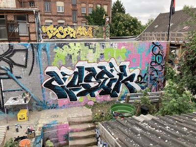 Colorful Stylewriting by Cosek. This Graffiti is located in Salzwedel, Germany and was created in 2021. This Graffiti can be described as Stylewriting and Wall of Fame.
