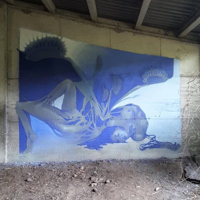 Light Blue and Blue Characters by Iota. This Graffiti was created in 2021 but its location is unknown. This Graffiti can be described as Characters, Abandoned and Murals.