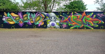 Colorful Stylewriting by angst and Idem. This Graffiti is located in Bitterfeld, Germany and was created in 2022. This Graffiti can be described as Stylewriting, Characters and Wall of Fame.