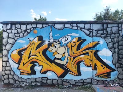 Orange and Grey Stylewriting by Gaps. This Graffiti is located in Leipzig, Germany and was created in 2022. This Graffiti can be described as Stylewriting, Characters and Wall of Fame.