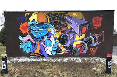 Light Blue and Violet Characters by petion_pet and kupsok_one. This Graffiti is located in Kluczbork, Poland and was created in 2022.