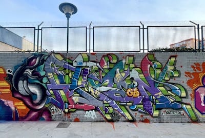 Colorful Stylewriting by Blunt and Ysen. This Graffiti is located in Malaga, Spain and was created in 2021. This Graffiti can be described as Stylewriting and Wall of Fame.