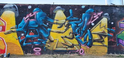 Blue and Yellow Stylewriting by fil, graffdinamics, mtr and urbansoldierz. This Graffiti is located in Zaragoza, Spain and was created in 2023. This Graffiti can be described as Stylewriting, Wall of Fame and Characters.