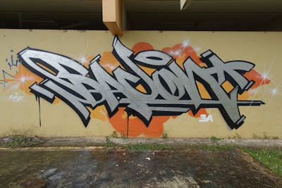 Chrome and Orange and Black Stylewriting by Bacon. This Graffiti is located in Puerto Rico and was created in 2017. This Graffiti can be described as Stylewriting and Street Bombing.