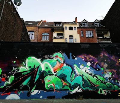 Light Green and Colorful Stylewriting by momo. This Graffiti is located in cologne, Germany and was created in 2020. This Graffiti can be described as Stylewriting.