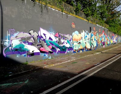 Colorful Stylewriting by Chr15, shik, SHET, Blind and Demon. This Graffiti is located in Essen, Germany and was created in 2023. This Graffiti can be described as Stylewriting, Characters and Wall of Fame.