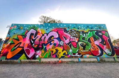 Colorful Stylewriting by Hmas and POSR. This Graffiti is located in Dresden, Germany and was created in 2022. This Graffiti can be described as Stylewriting and Characters.