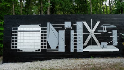 Black and Grey Stylewriting by Qumes. This Graffiti was created in 2023 but its location is unknown. This Graffiti can be described as Stylewriting and Futuristic.
