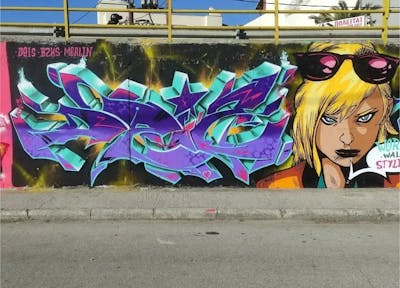 Violet and Cyan Stylewriting by Deis149 and bzks. This Graffiti is located in Katerini, Greece and was created in 2022. This Graffiti can be described as Stylewriting and Characters.