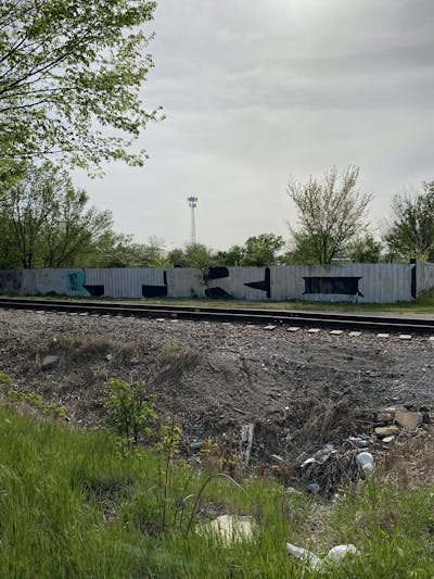 Chrome and Black Stylewriting by Tko Crew. This Graffiti is located in Tulsa, United States and was created in 2024. This Graffiti can be described as Stylewriting and Line Bombing.