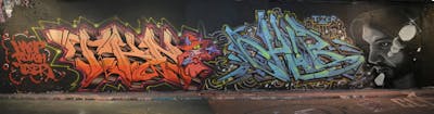 Colorful Stylewriting by Tkno, Chips and DavePlant. This Graffiti is located in London, United Kingdom and was created in 2021. This Graffiti can be described as Stylewriting, Characters and Wall of Fame.