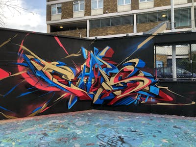 Light Blue and Beige and Red Stylewriting by Chips. This Graffiti is located in London, United Kingdom and was created in 2022. This Graffiti can be described as Stylewriting and Wall of Fame.